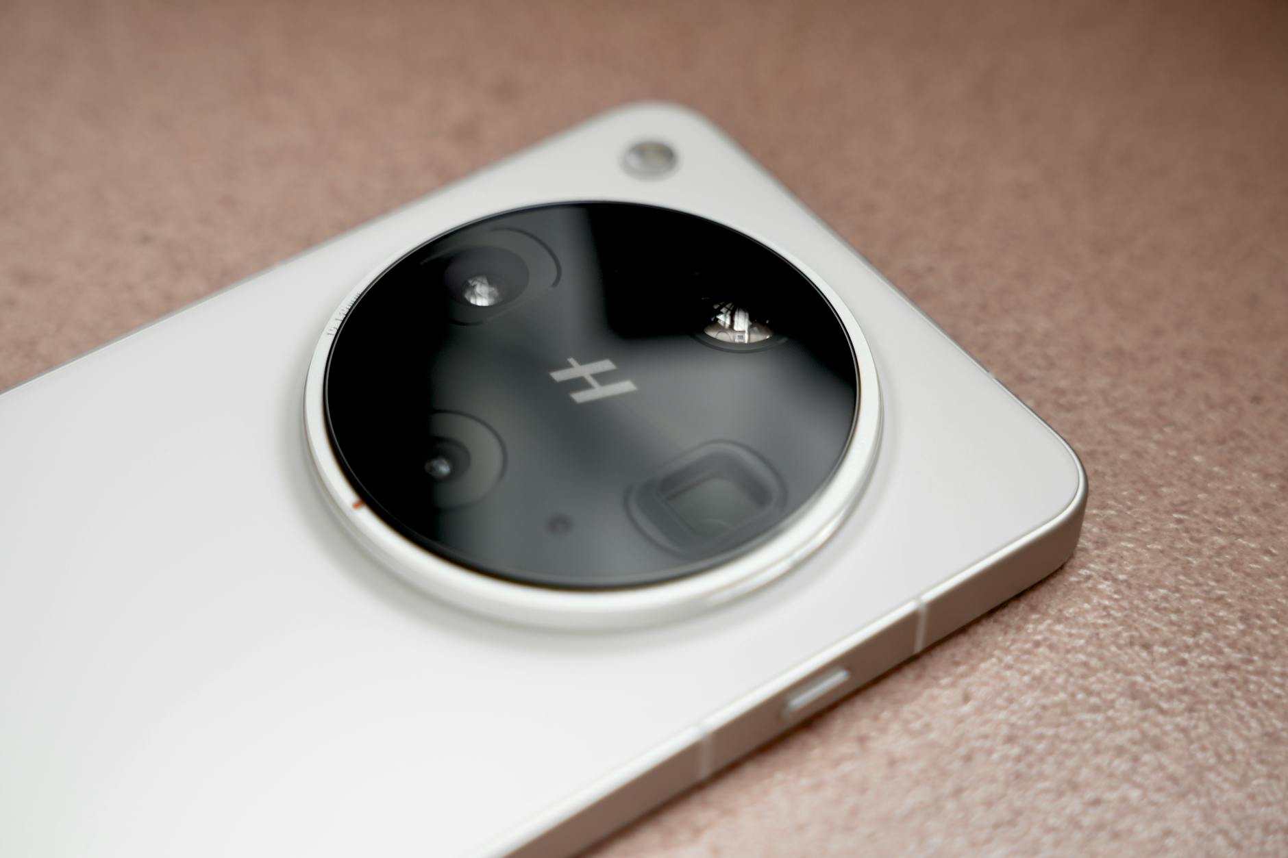 Close-up view of smartphone camera lens showing multiple sensors and advanced optics technology