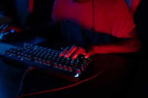 Close-up of illuminated mechanical gaming keyboard with RGB backlighting