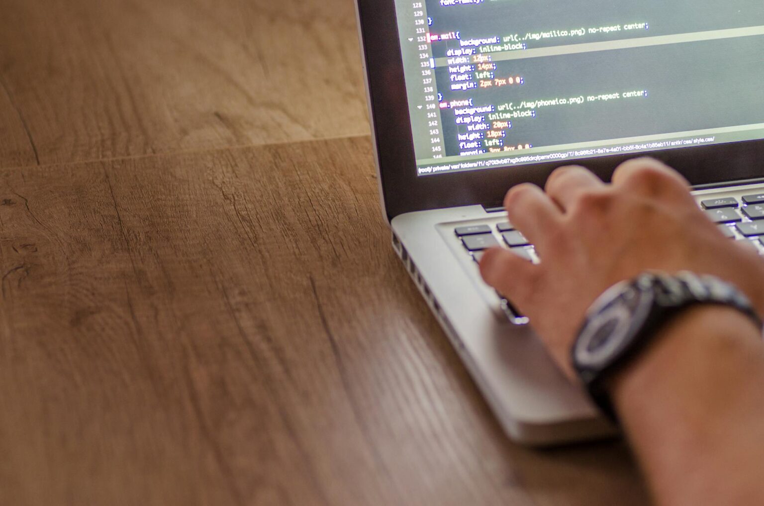 Why Web Developers Are Migrating from React to Svelte for Frontend Projects Developer working on code at laptop showing frontend development work