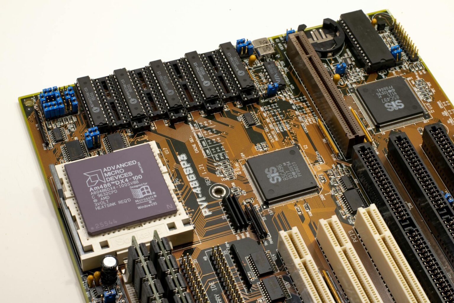 How ARM-Based Desktop Processors Are Finally Challenging Intel’s Dominance Close-up view of a modern computer processor chip on a circuit board showing advanced semiconductor technology