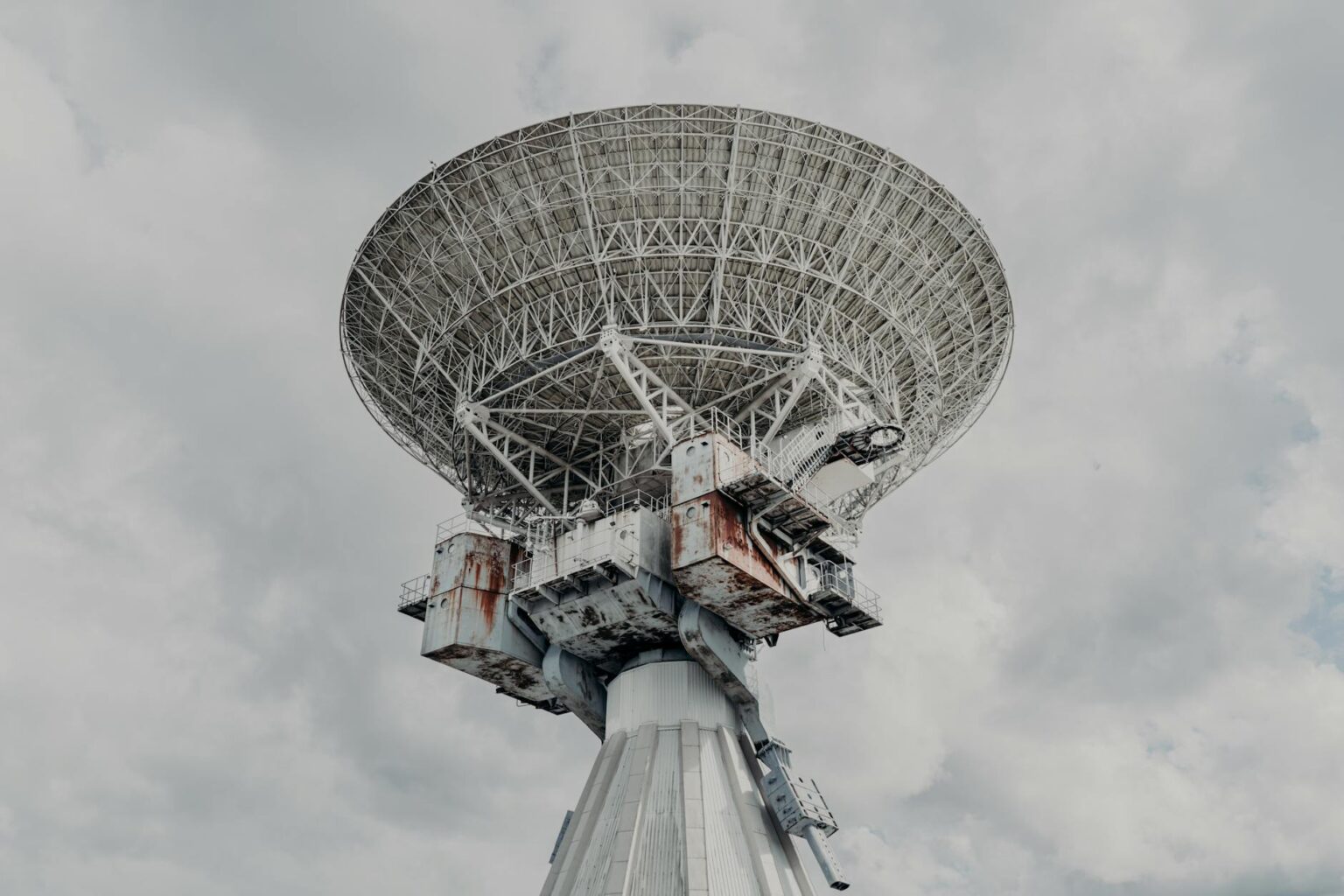 Satellite Connectivity Is Becoming Standard in Mid-Range Smartphones This Year Large satellite dish pointing toward the sky for communication connectivity