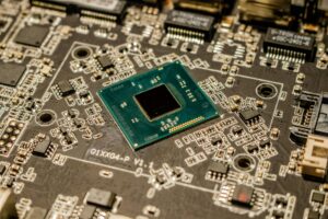 Why Graphics Card Manufacturers Are Building Cryptocurrency Mining Restrictions Into Hardware Close-up view of computer circuit board with electronic components and pathways