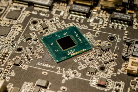 Why Graphics Card Manufacturers Are Building Cryptocurrency Mining Restrictions Into Hardware Close-up view of computer circuit board with electronic components and pathways