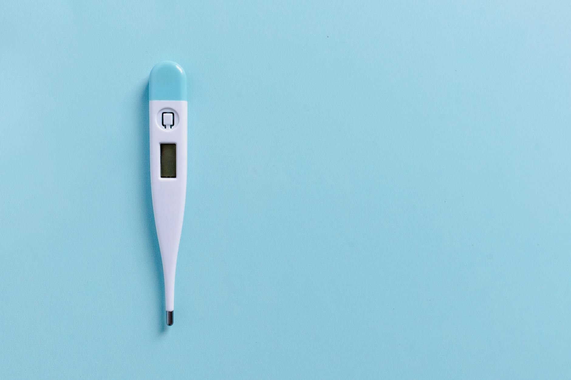 Digital thermometer displaying temperature reading for health monitoring
