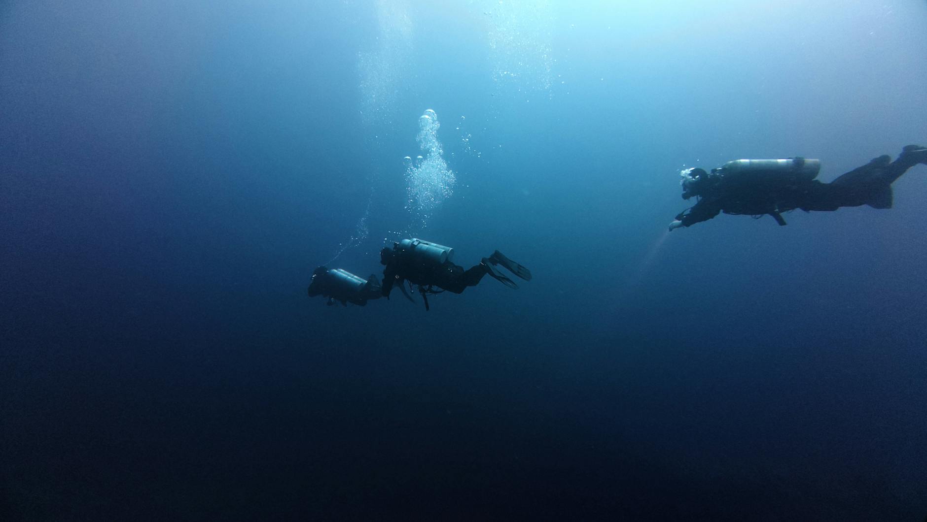 Research vessel on ocean surface with advanced scientific equipment and technology