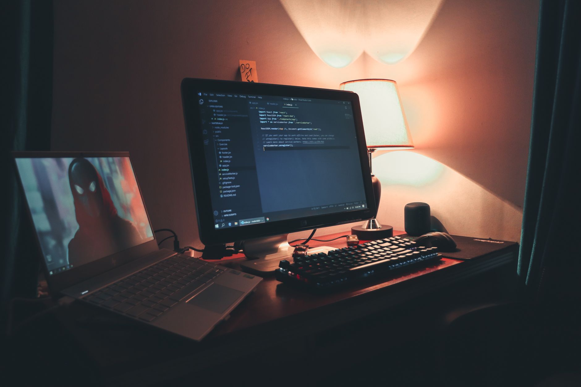 Developer working on code in a dark room, representing game modding work