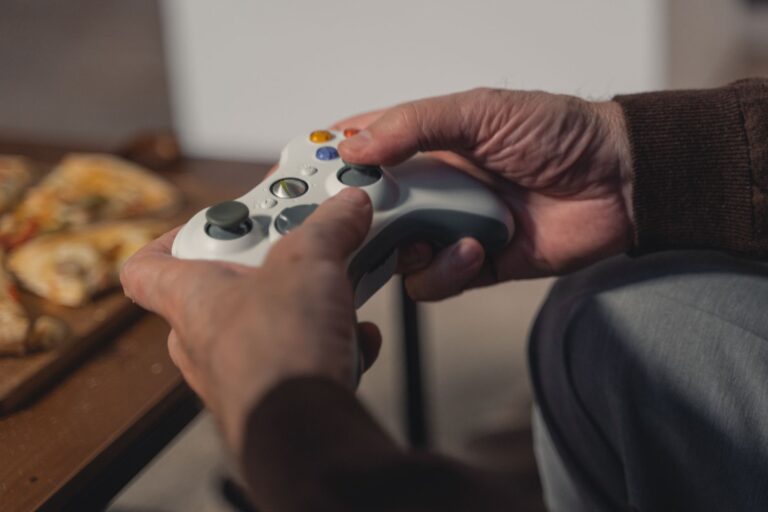 A modern gaming console on a shelf, representing the PS5 product lineup