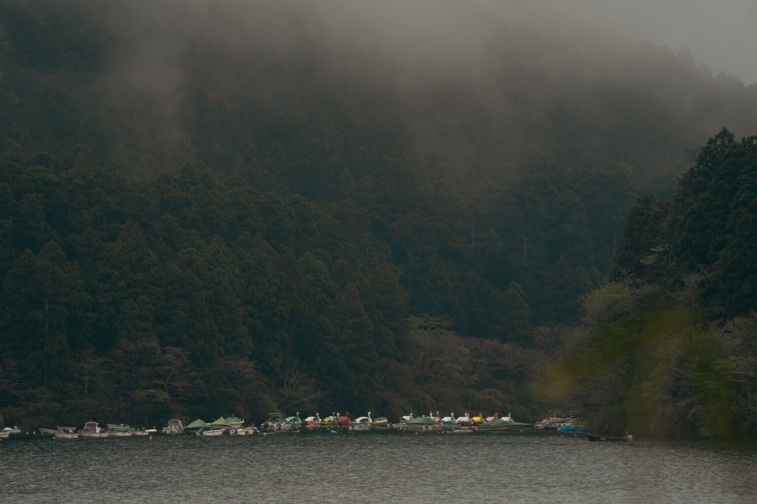 Sony’s Ghost of Yōtei Buzz Is Pulling Players Back to Tsushima Misty Japanese landscape with mountains and forest, evoking the setting of Ghost of Tsushima