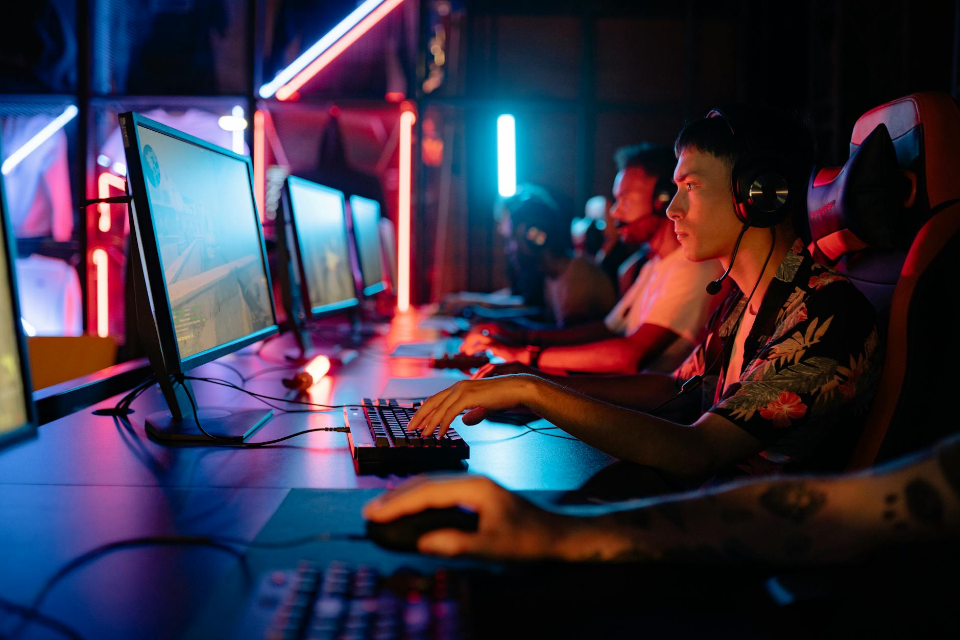Competitive gamer focused on screen during ranked match