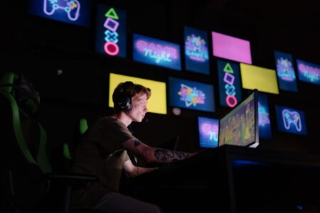 Bungie’s Marathon Launch Stumble Is Funneling Players Back to Escape From Tarkov A gamer sitting in front of a screen with a look of frustration during gameplay