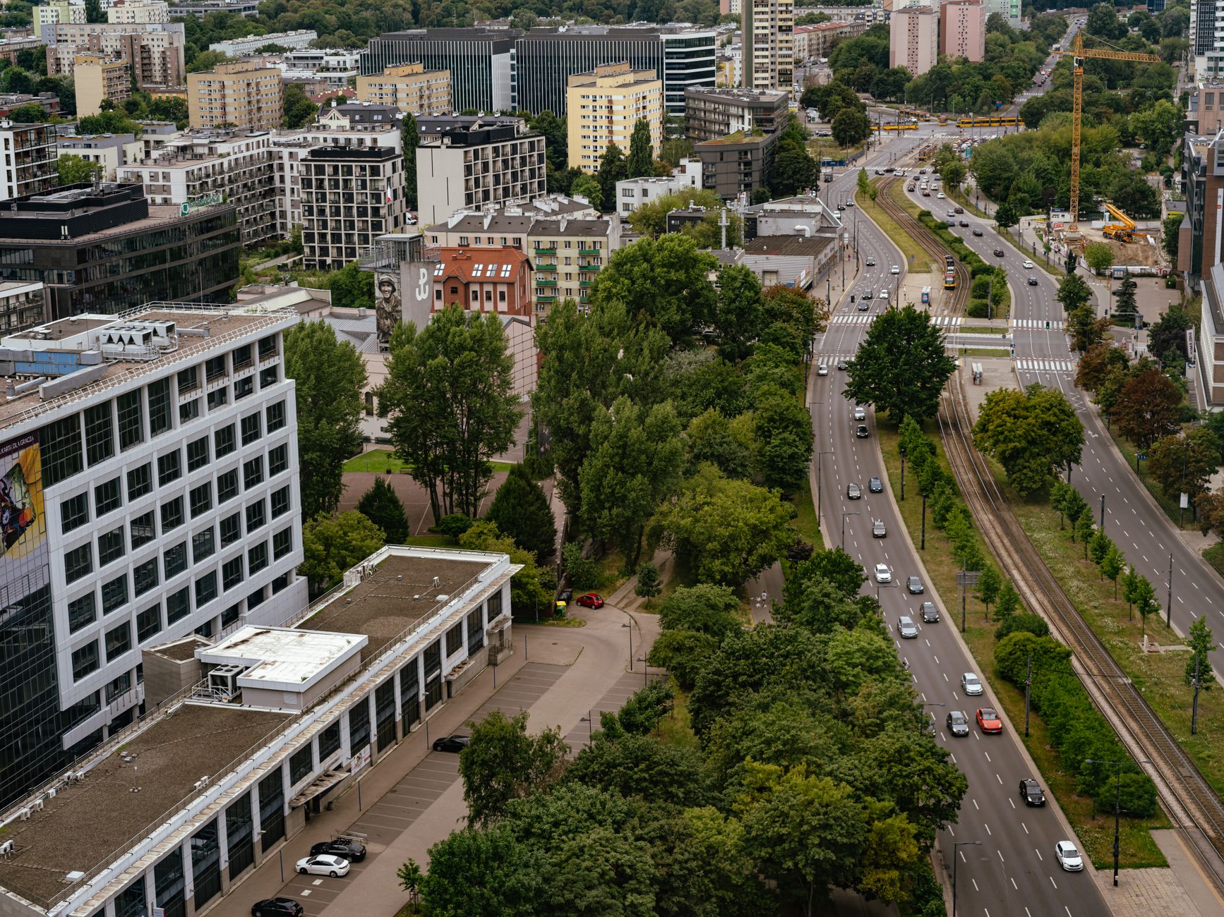 Aerial view of busy city streets with dense traffic, representing urban driving gameplay