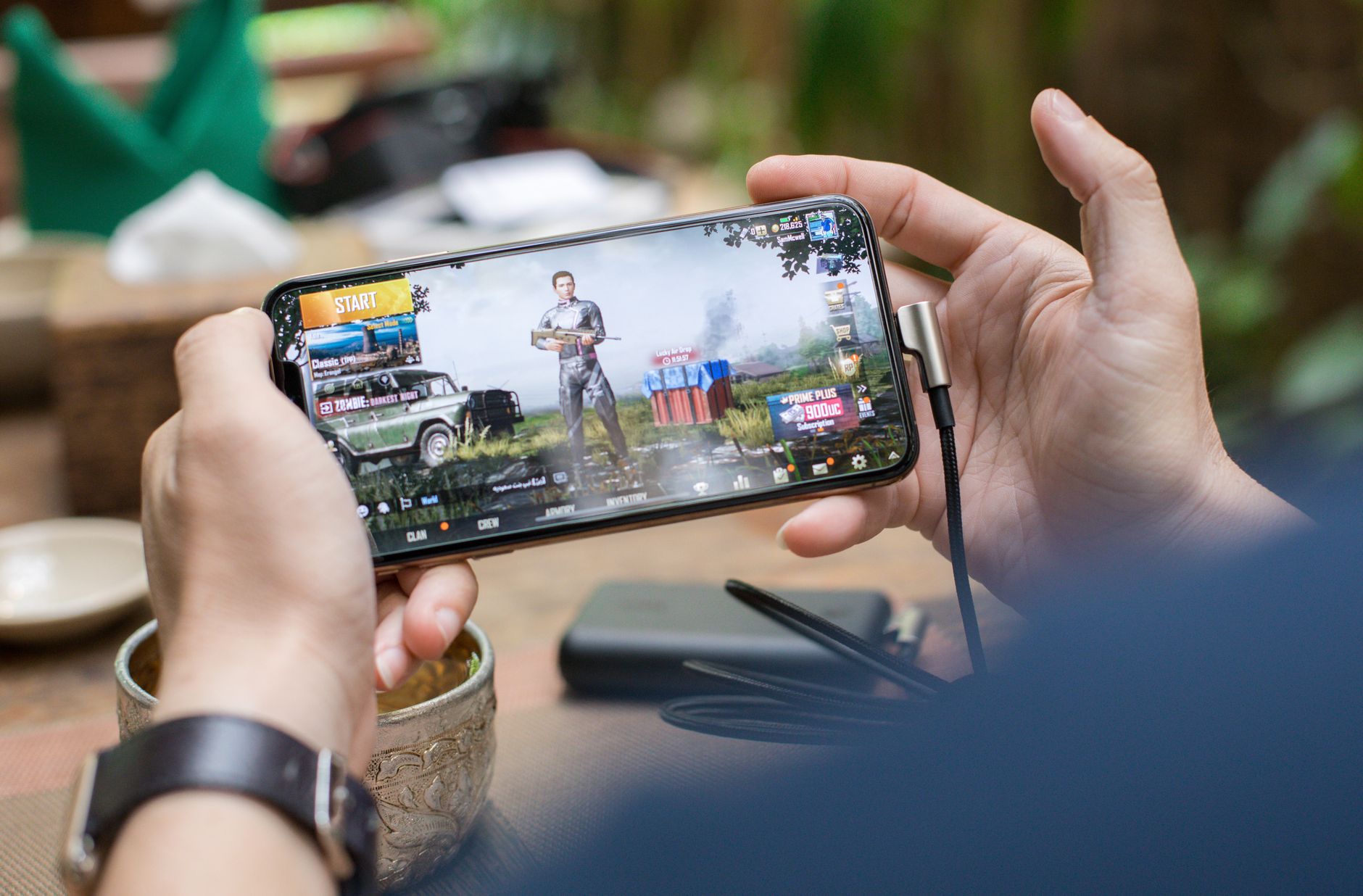 A close-up of a screen displaying a first-person shooter game, representing the extraction shooter genre