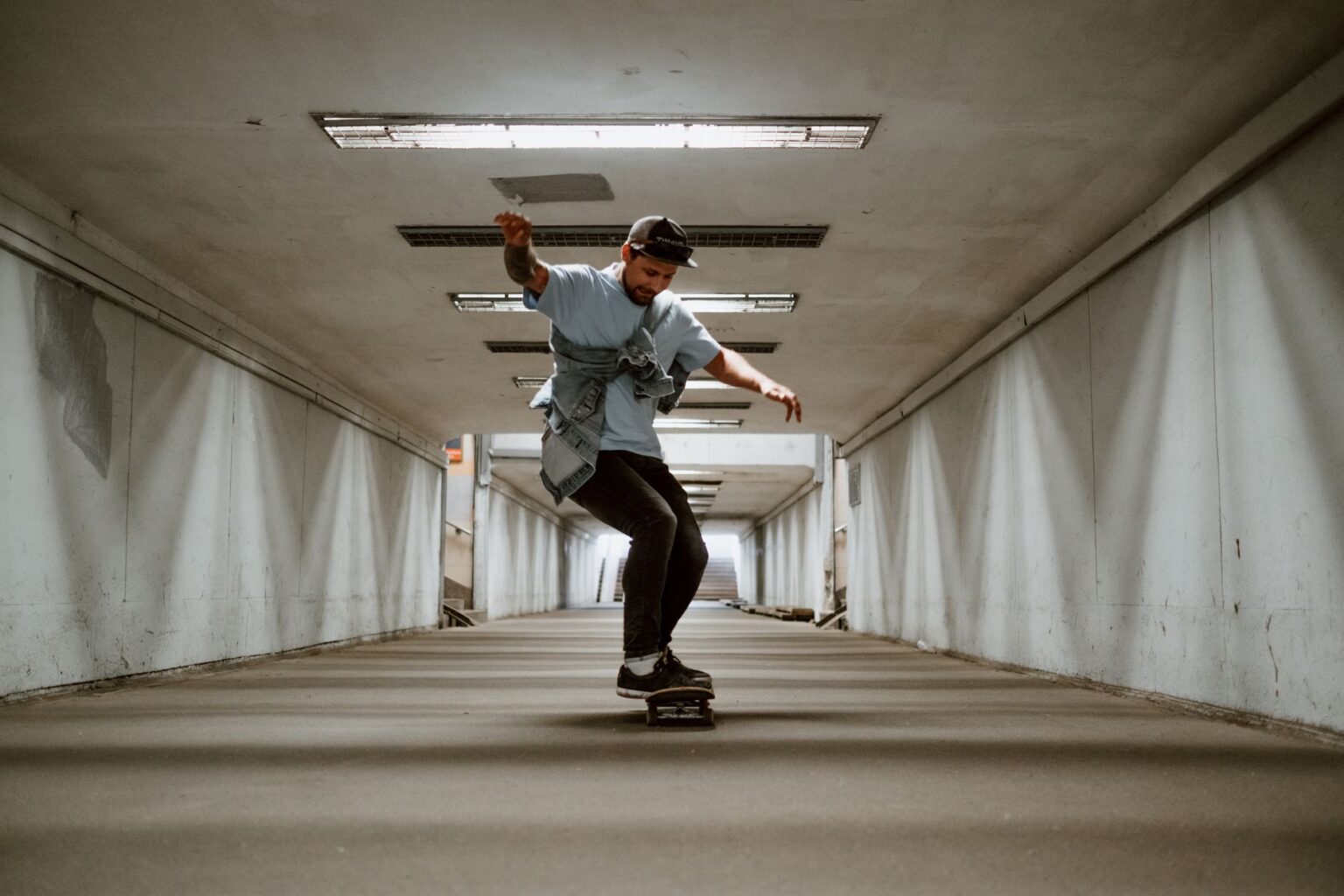 A skateboarder performing a trick at a skate park, representing the skateboarding game genre revival
