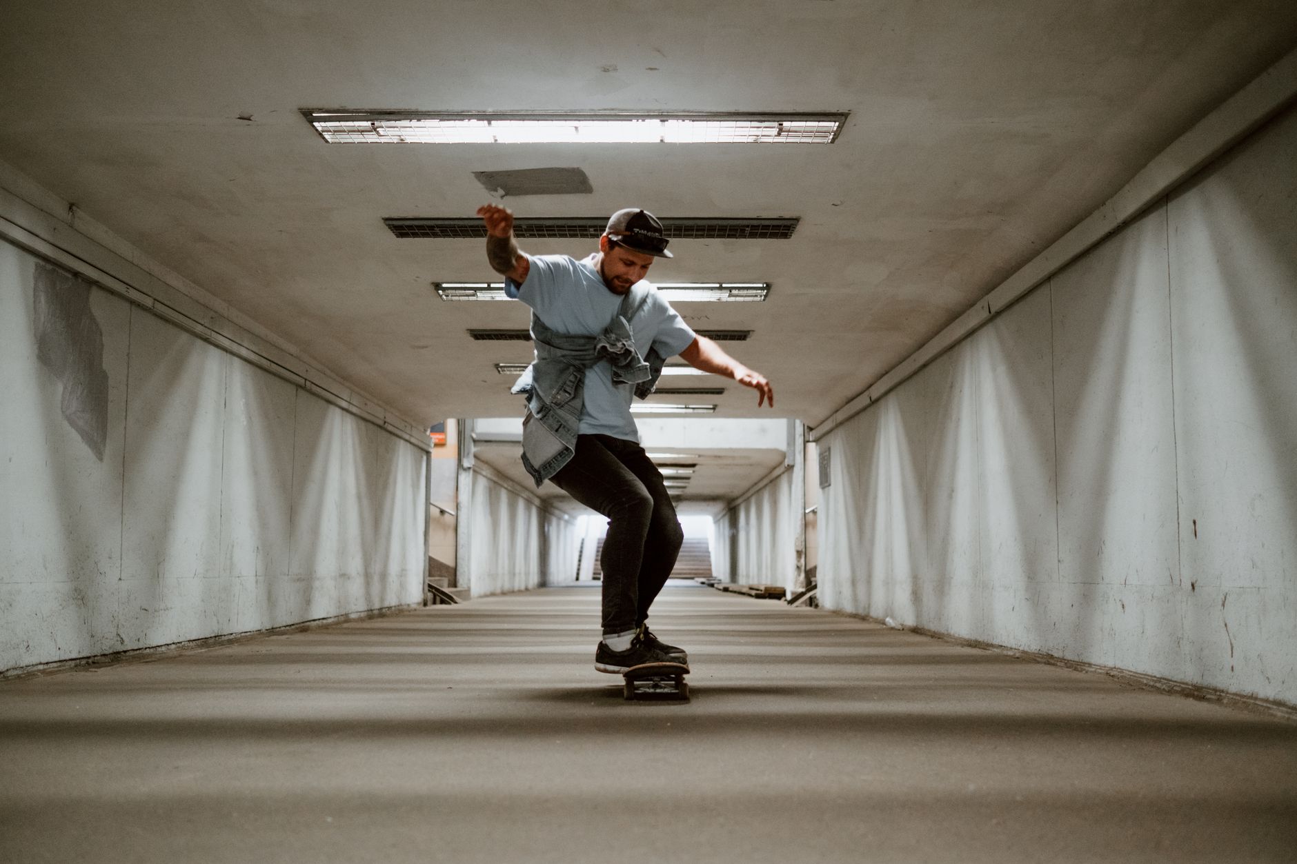 A skateboarder performing a trick at a skate park, representing the skateboarding game genre revival