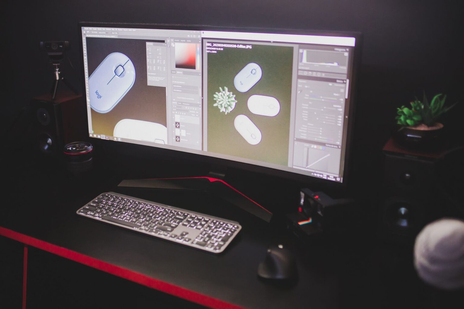 A dark gaming setup with a monitor displaying a colorful game interface