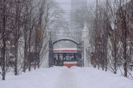 Sony’s Ghost of Yotei Silence Is Pulling Players Back to Tsushima A snow-covered mountain path with a traditional torii gate, evoking the setting of Ghost of Yotei