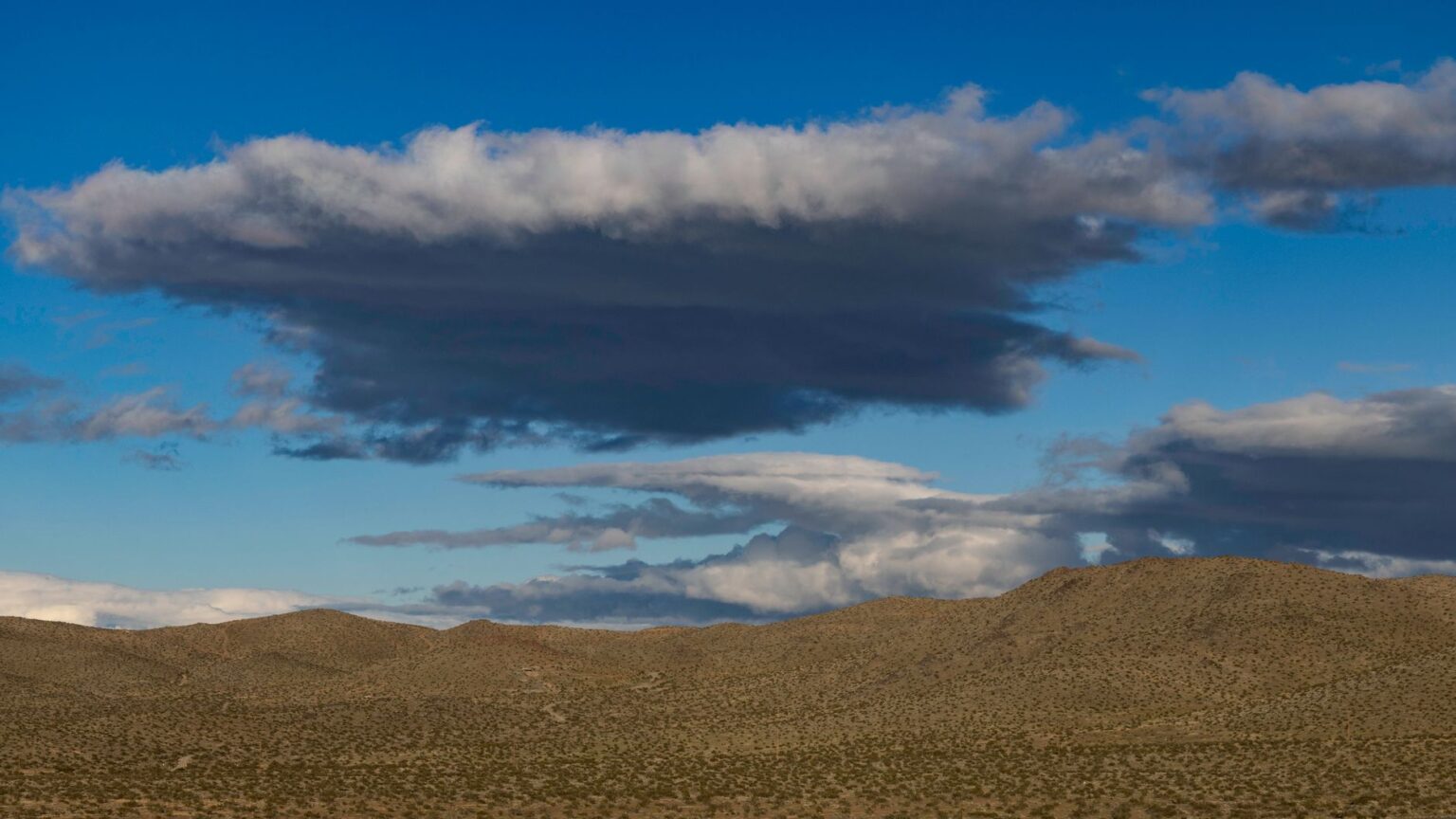 Rockstar’s Red Dead Redemption 2 Quiet Patch Is Cooling GTA VI Patience Wide open western desert landscape evoking the setting of Red Dead Redemption 2