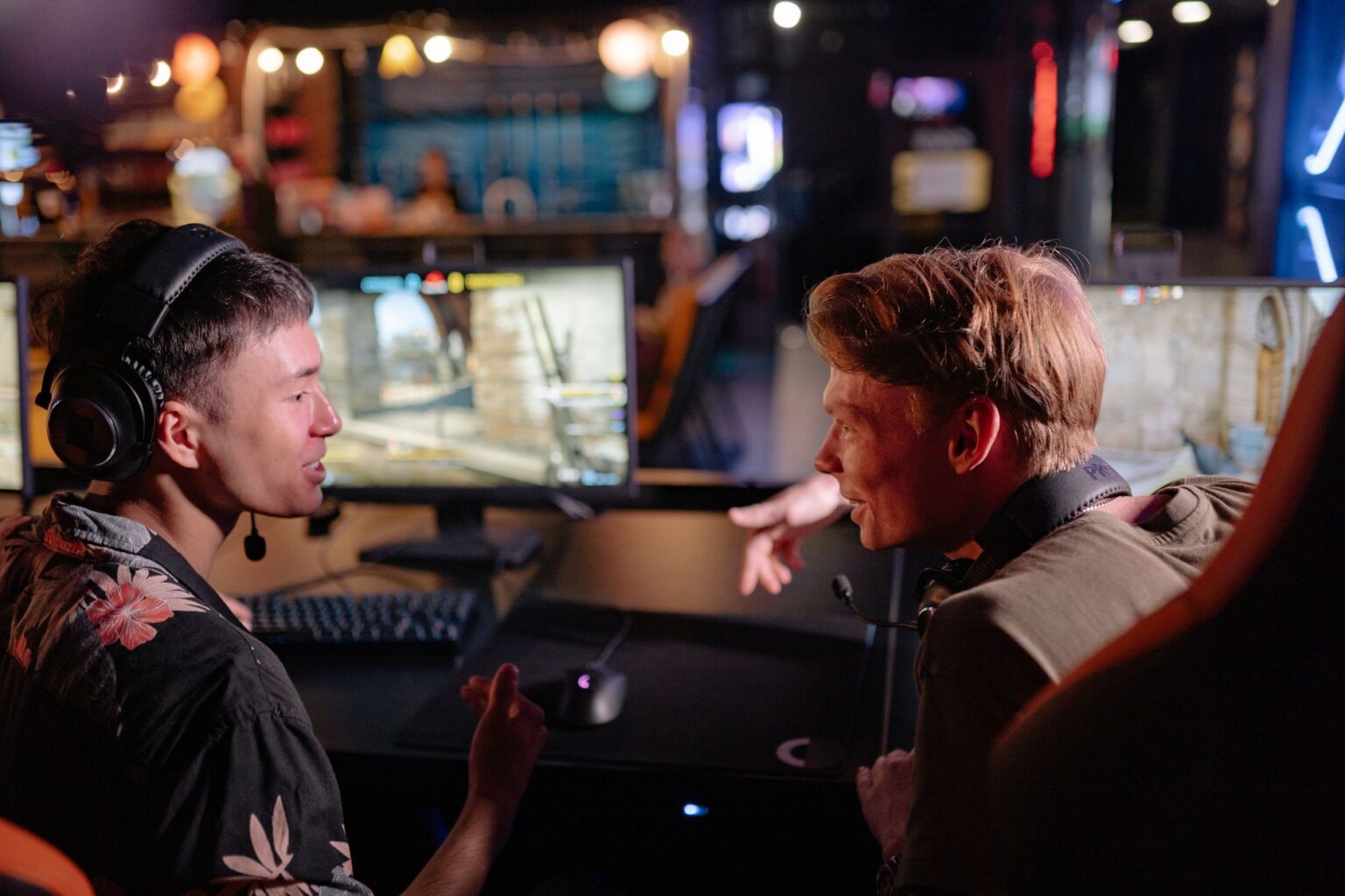 A player engaged with an RPG game on a television screen in a dark room