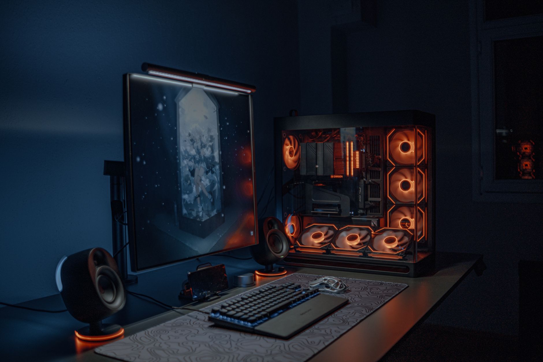 Gaming setup with monitor glowing in a dark room, representing players returning to a familiar survival game