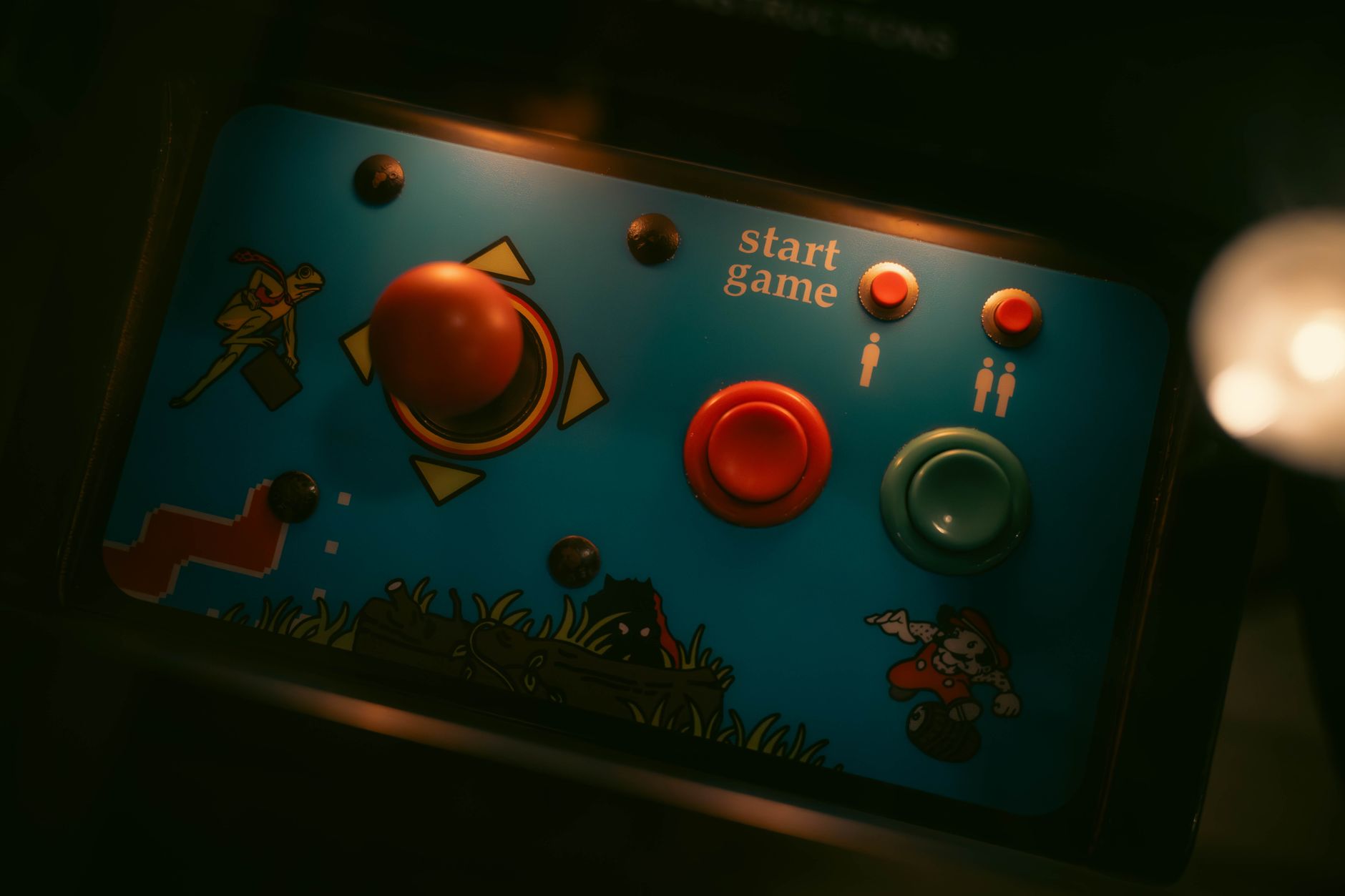 A gamer revisiting older game content on a monitor, representing nostalgia-driven play