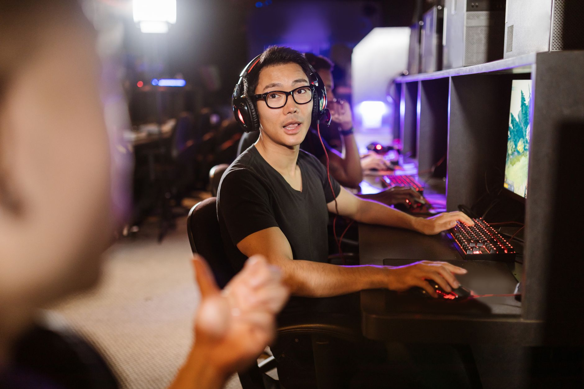 Multiple people engaged in online gaming activity, representing an active fan community