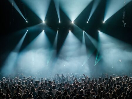Colorful stage lighting at a live music concert venue