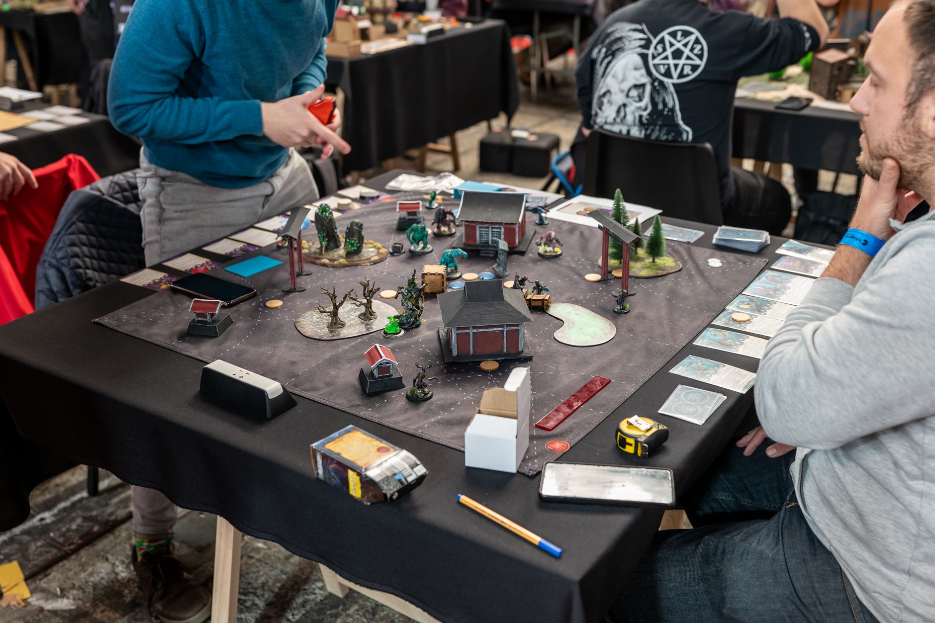 A gaming setup with a monitor displaying an RPG game, representing the Dragon Age franchise revival