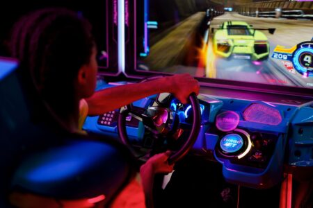 Close-up of a racing video game being played on a television screen