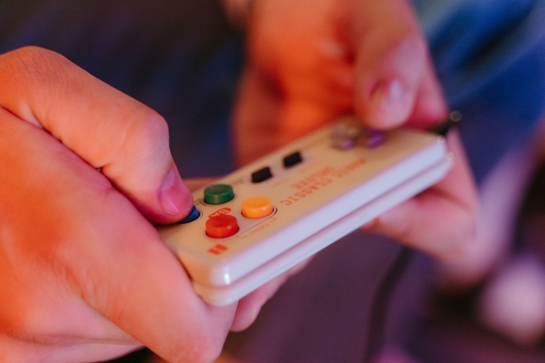 Close-up of a gaming controller resting on a surface, representing player activity and engagement