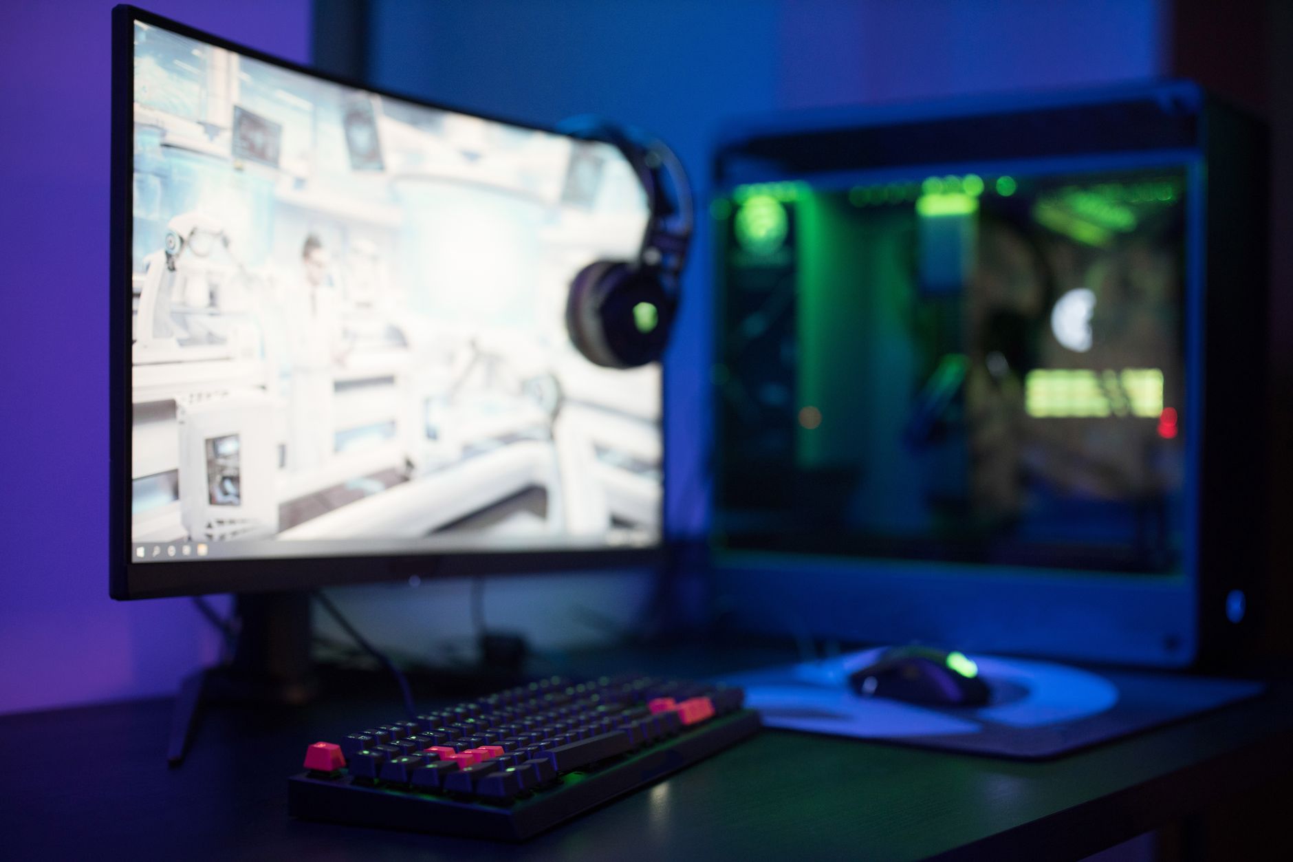 PC gaming monitor setup representing the growing PC player audience for Sony PlayStation titles