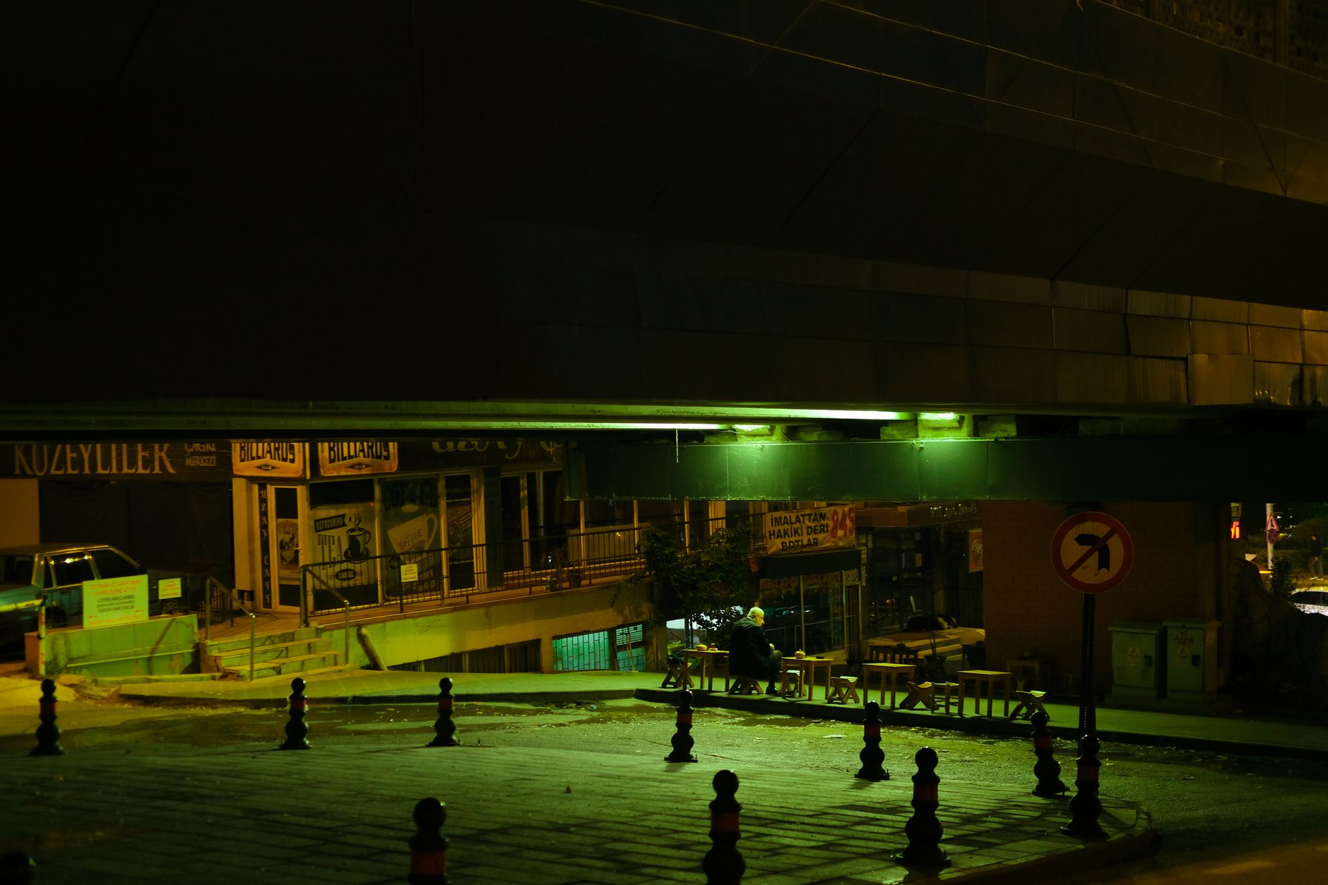 A busy urban street at night, evoking the open-world city environments of the GTA franchise