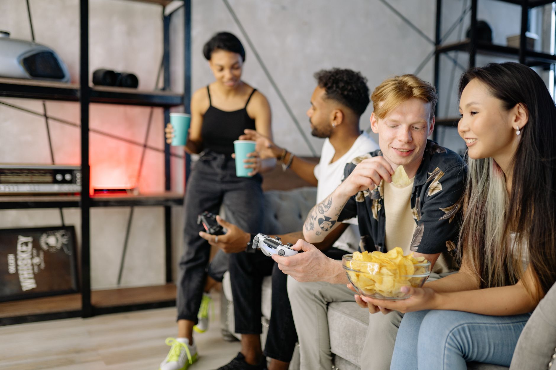 Players gathered around screens engaging with a gaming community online