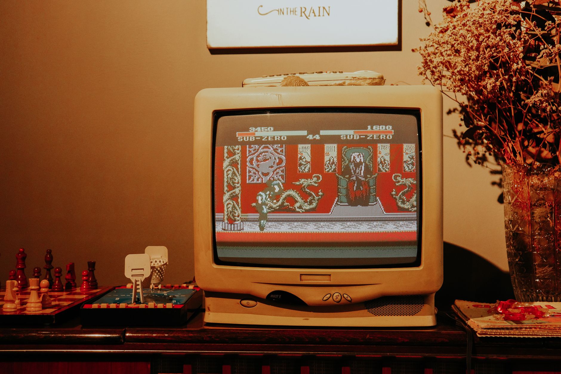 A television screen displaying gameplay footage in a home gaming setup